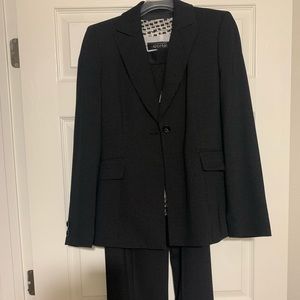 Black and White 3 piece pin stripe suit.